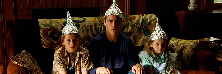 signs-movie-foil-hats-joaquin-phoenix.jpg