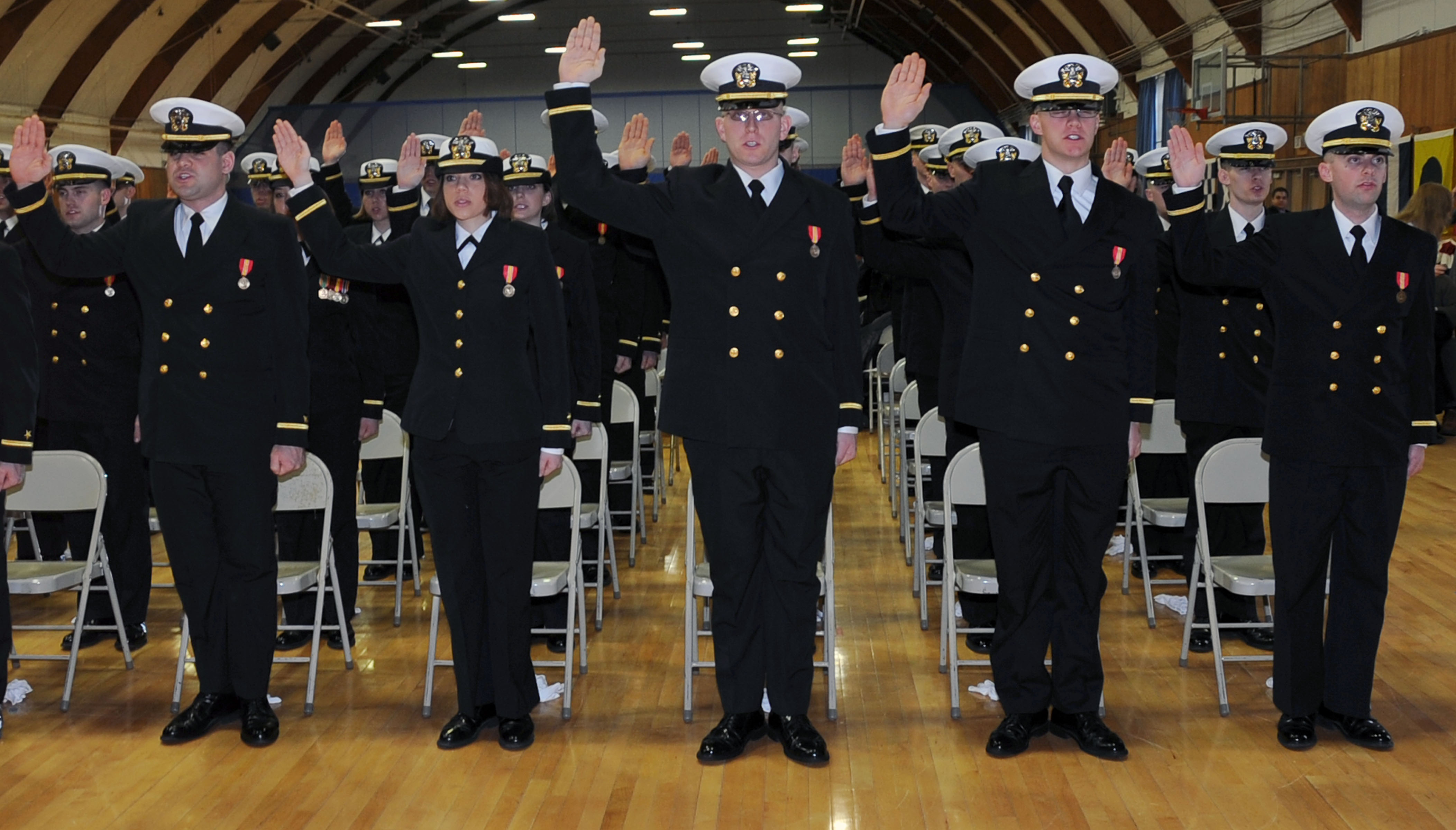 US_Navy_110311-N-WQ300-023_More_than_80_officer_candidates_take_the_oath_of_office_during_a_commissioning_ceremony_at_Navy_Officer_Candidate_Schoo.jpg
