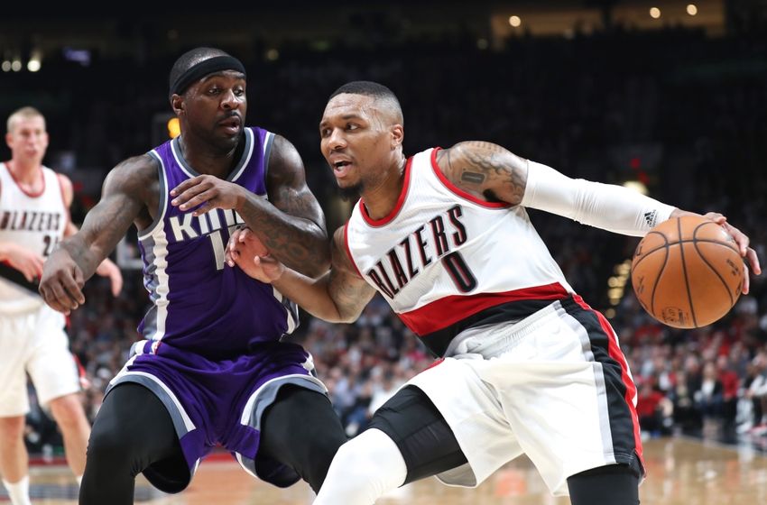 9670584-damian-lillard-ty-lawson-nba-sacramento-kings-portland-trail-blazers-850x560.jpg